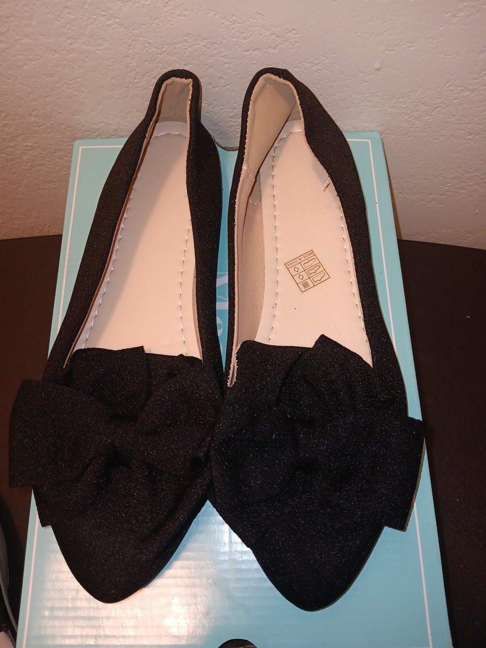 Black Pointed-Toe Women’s Flats with Bow Accent